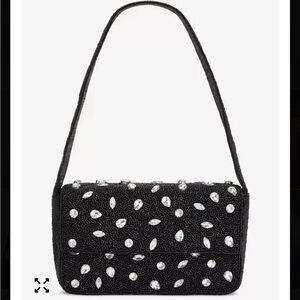 On 34th hand beaded shoulder bag features a black beaded